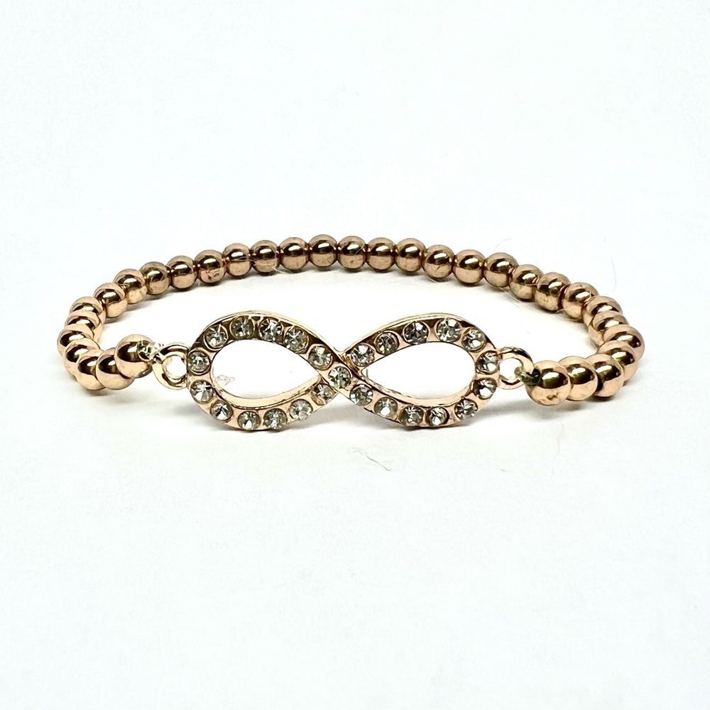 NEW w/ Tag Rose Gold Tone Infinity Symbol Bracelet w/ Sparkling White Crystals
